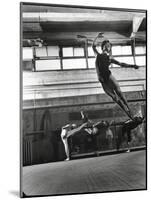 Jean Babilee, Star of Ballets Des Champs Elysees, Leaping During Practice as Other Dancers Watch-Gjon Mili-Mounted Photographic Print