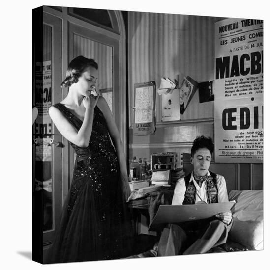 Jean Cocteau Sketching Model Elizabeth Gibbons in a Chanel Dress in His Hotel Bedroom-Roger Schall-Stretched Canvas