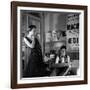 Jean Cocteau Sketching Model Elizabeth Gibbons in a Chanel Dress in His Hotel Bedroom-Roger Schall-Framed Premium Photographic Print