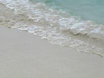 Sea, beach and sand, gentle waves picking up sand particles, Galapagos Islands-Jean Hosking-Photographic Print