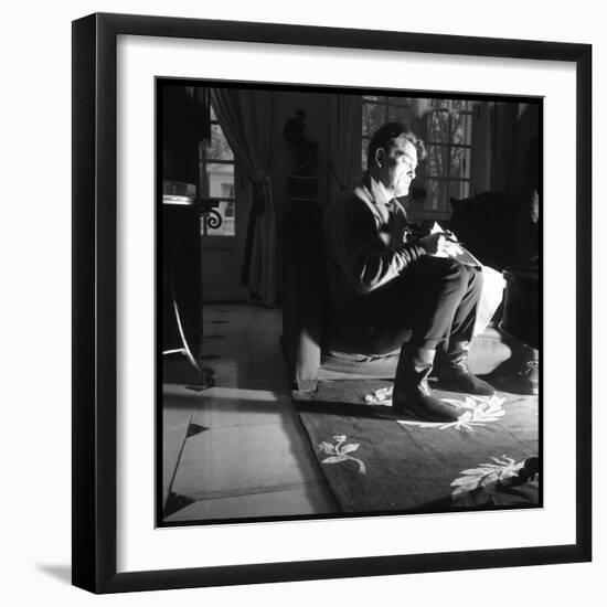 Jean Marais Reading the Newspaper-null-Framed Photographic Print