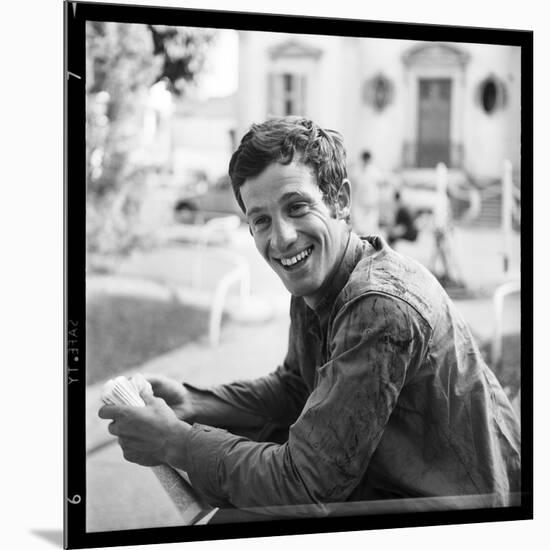 Jean-Paul Belmondo, Posing Near the Seine, Paris-Marcel Begoin-Mounted Photographic Print