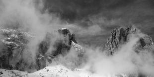 Clouds hang between the mountains of the Dolomites-Jean Schwarz-Framed Stretched Canvas