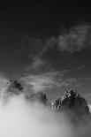 Clouds hang between the mountains of the Dolomites-Jean Schwarz-Stretched Canvas