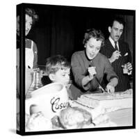 Jeanne Moreau Slicing a Cake-DR-Stretched Canvas