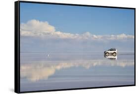 Jeep driving on the reflected surface of the salt flat, Salar de Uyuni, Potosi Department, Bolivia.-Keren Su-Framed Stretched Canvas