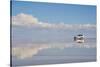 Jeep driving on the reflected surface of the salt flat, Salar de Uyuni, Potosi Department, Bolivia.-Keren Su-Stretched Canvas