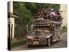 Jeepney Truck with Passengers Crowded on Roof, Coron Town, Busuanga Island, Philippines-Kober Christian-Stretched Canvas