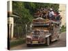 Jeepney Truck with Passengers Crowded on Roof, Coron Town, Busuanga Island, Philippines-Kober Christian-Stretched Canvas