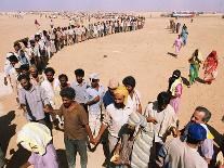 Kuwait Refugees Wait for Bread 1990-Jeff Widener-Stretched Canvas