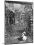 Jemima Puddle-Duck Posing in Front of Iron Gate Outside Beatrix Potter's Home-George Rodger-Mounted Photographic Print