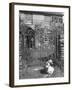 Jemima Puddle-Duck Posing in Front of Iron Gate Outside Beatrix Potter's Home-George Rodger-Framed Photographic Print