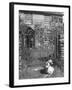 Jemima Puddle-Duck Posing in Front of Iron Gate Outside Beatrix Potter's Home-George Rodger-Framed Photographic Print