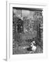 Jemima Puddle-Duck Posing in Front of Iron Gate Outside Beatrix Potter's Home-George Rodger-Framed Photographic Print