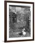 Jemima Puddle-Duck Posing in Front of Iron Gate Outside Beatrix Potter's Home-George Rodger-Framed Photographic Print