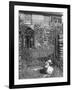 Jemima Puddle-Duck Posing in Front of Iron Gate Outside Beatrix Potter's Home-George Rodger-Framed Photographic Print