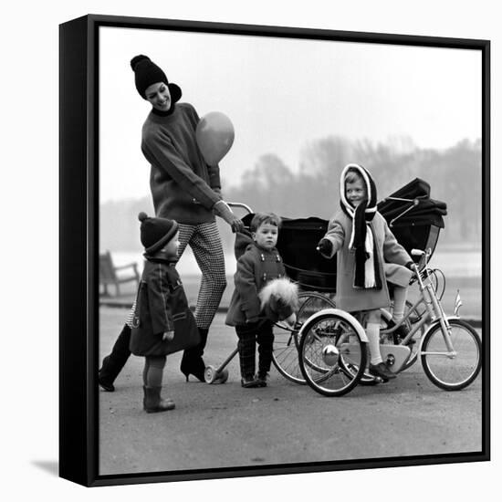 Jenny Boyd in Light Pants and Boots with Children, 1960s-John French-Framed Stretched Canvas