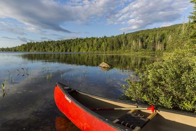 A Canoe on the Shore of Bald Mountain Pond. Bald Mountain Township, Maine