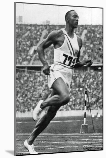 Jesse Owens at the End of the 100M at the Berlin Olympic Games, 1936-null-Mounted Giclee Print