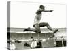 Jesse Owens in Action at the Long Jump During the Berlin Olympics, 1936-null-Stretched Canvas