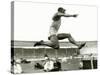 Jesse Owens in Action at the Long Jump During the Berlin Olympics, 1936-null-Stretched Canvas