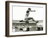 Jesse Owens in Action at the Long Jump During the Berlin Olympics, 1936-null-Framed Photographic Print