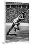 Jesse Owens Setting the 200 Meter Olympic Record at the Olympics in Berlin, Germany, 1936-null-Framed Art Print