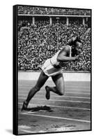 Jesse Owens Setting the 200 Meter Olympic Record at the Olympics in Berlin, Germany, 1936-null-Framed Stretched Canvas