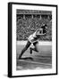 Jesse Owens Setting the 200 Meter Olympic Record at the Olympics in Berlin, Germany, 1936-null-Framed Art Print