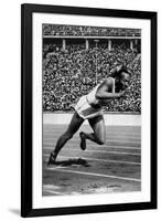 Jesse Owens Setting the 200 Meter Olympic Record at the Olympics in Berlin, Germany, 1936-null-Framed Art Print