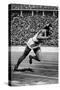Jesse Owens Setting the 200 Meter Olympic Record at the Olympics in Berlin, Germany, 1936-null-Stretched Canvas