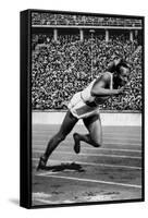 Jesse Owens Setting the 200 Meter Olympic Record at the Olympics in Berlin, Germany, 1936-null-Framed Stretched Canvas