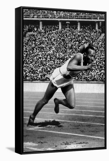 Jesse Owens Setting the 200 Meter Olympic Record at the Olympics in Berlin, Germany, 1936-null-Framed Stretched Canvas