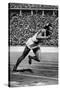 Jesse Owens Setting the 200 Meter Olympic Record at the Olympics in Berlin, Germany, 1936-null-Stretched Canvas