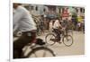 Jessore, Bangladesh. A man cycles to work through the centre of town.-Tom Martin-Framed Photographic Print