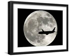 Jet Plane Passes in Front of the Full Moon Above Surfside, Florida-null-Framed Photographic Print