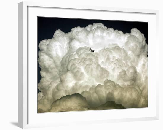 Jetliner Flies into a Cloud Bank as it Descends into the Washington D.C. Area-null-Framed Photographic Print