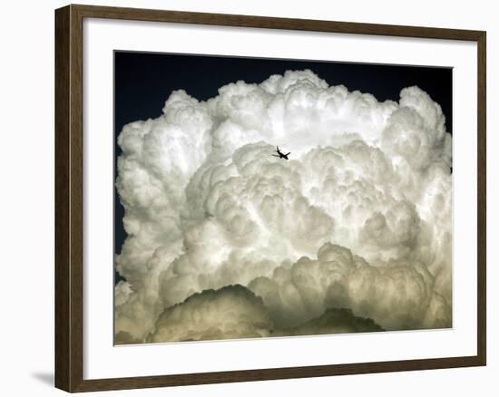 Jetliner Flies into a Cloud Bank as it Descends into the Washington D.C. Area-null-Framed Photographic Print