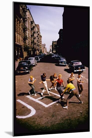 Jets' Dance on Busy Street in Scene from West Side Story-Gjon Mili-Mounted Photographic Print