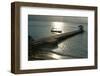 Jetty and a boat at sunset in the Caribbean-Natalie Tepper-Framed Photo