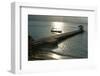 Jetty and a boat at sunset in the Caribbean-Natalie Tepper-Framed Photo