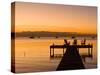 Jetty at Sunset, Caye Caulker, Belize-Russell Young-Stretched Canvas