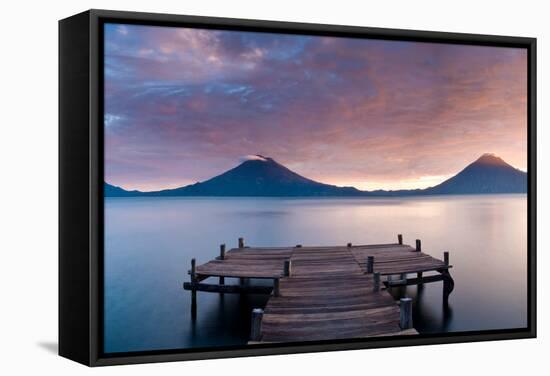 Jetty in a lake with a mountain range in the background, Lake Atitlan, Santa Cruz La Laguna, Wes...-null-Framed Stretched Canvas