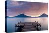 Jetty in a lake with a mountain range in the background, Lake Atitlan, Santa Cruz La Laguna, Wes...-null-Stretched Canvas