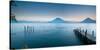 Jetty in a Lake with a Mountain Range in the Background, Lake Atitlan, Santa Cruz La Laguna-null-Stretched Canvas