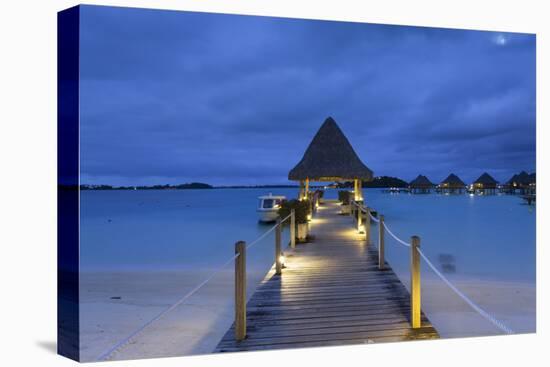 Jetty of Intercontinental Bora Bora Le Moana Resort at Dusk, Bora Bora, Society Islands-Ian Trower-Stretched Canvas