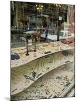 Jewelry Store with Cars Reflected in the Window-null-Mounted Photographic Print