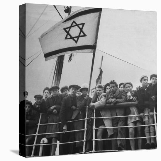 Jewish Immigrants, Arriving in Haifa Aboard Refugee Ship, Waving Future Flag of the State of Israel-Dmitri Kessel-Stretched Canvas