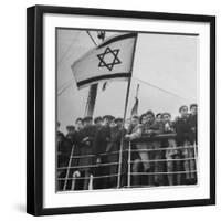 Jewish Immigrants, Arriving in Haifa Aboard Refugee Ship, Waving Future Flag of the State of Israel-Dmitri Kessel-Framed Premium Photographic Print