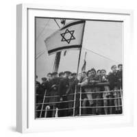 Jewish Immigrants, Arriving in Haifa Aboard Refugee Ship, Waving Future Flag of the State of Israel-Dmitri Kessel-Framed Photographic Print